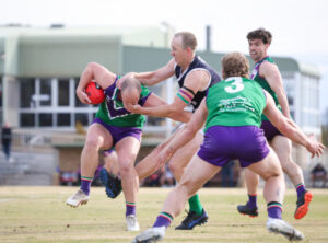 Magpies win slog in the cold