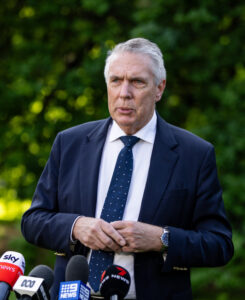 Walsh steps down