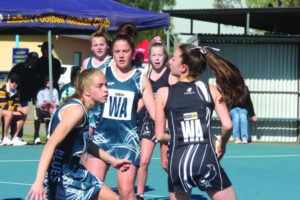 Junior netballers fly local flag