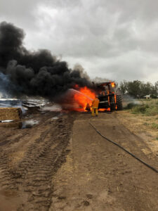 Tractor and hay fire