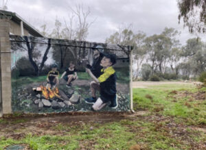 Mural artist is prepared with local Scouts