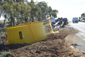 Transport over: driver escapes injury