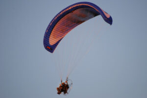 Dairy farmer on the ground, daring pilot in the air
