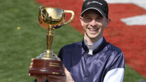 Jye McNeil rides Twilight Payment to Melbourne Cup glory