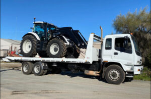 Tractor dealer ploughing ahead