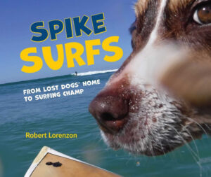 ‘Paws’ for thought as Spike the Surfing Dog checks out library