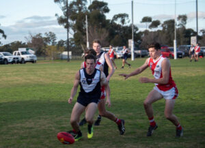Dogs hold off Bears’ fast finish