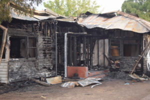House gutted, woman injured