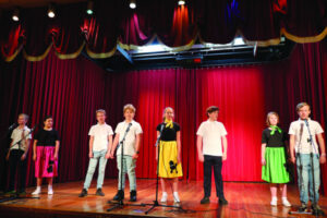 Students prepare to hit the stage