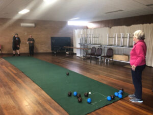 Carpet bowls roll on