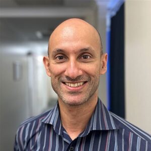 Former student returns with a vision